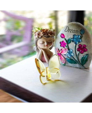 Papillon décoratif en verre jaune